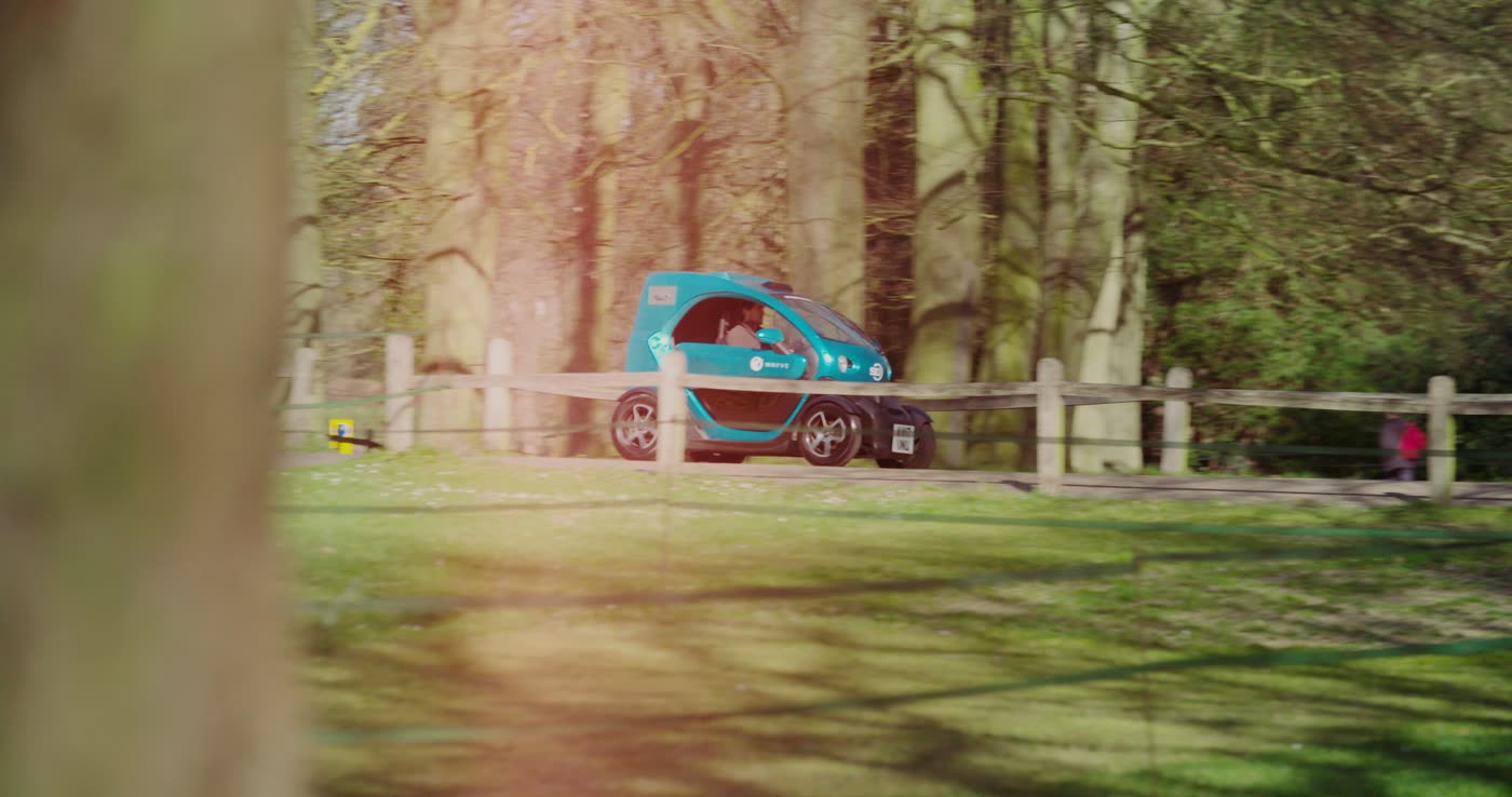A Wayve self-driving car on a rural road